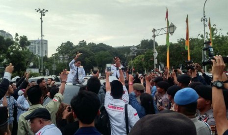 Gubernur dan Wakil Gubernur DKI Jakarta, Anies Baswedan dan Sandiaga Uno usai pelantikan di Istana Negara, Jakarta.