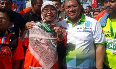 Gubernur Jawa Barat Ahmad Heryawan dan Istri di kegiatan West Java Eco Marathon