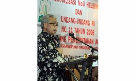 Gubernur Nanggroe Aceh Darussalam Zaini Abdullah saat pembukaan Sosialisasi MOU Helsinki dan UU No 11/2006 Tntan Pemerintah Aceh, di Jakarta, Jumat (8/8). (Republika/Adhi Wicaksono)