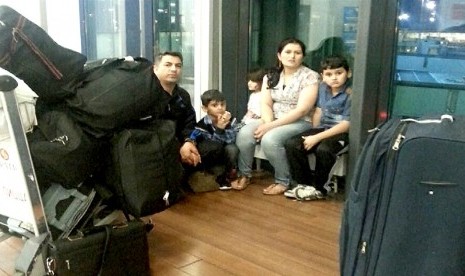 Hasan Abdo Ahmad dan keluarganya dari Irak terperangkap di Bandara Sheremetyevo Moskow.