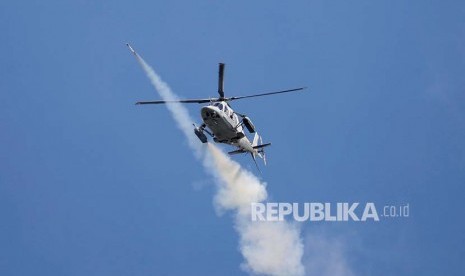 Helikopter pemerintah menembakkan roket ke arah kelompok bersenjata Maute di Marawi City, Filipina Selatan.