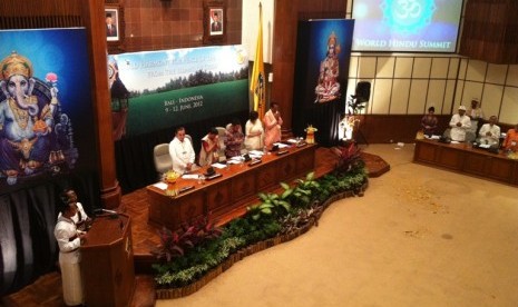 Hindu priests contemplate in the opening of World Hindu Summit in Bali.