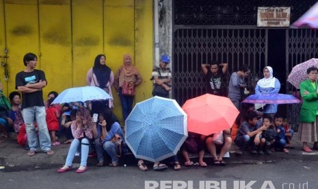 Hujan ringan mengguyur satu sudut di Ibu Kota.