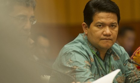 Husni Kamil Manik 