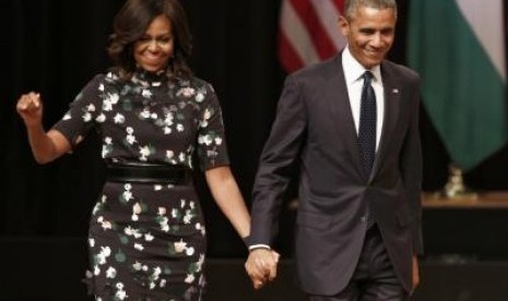 Ibu Negara AS, Michelle Obama, bersama Presiden AS, Barrack Obama.