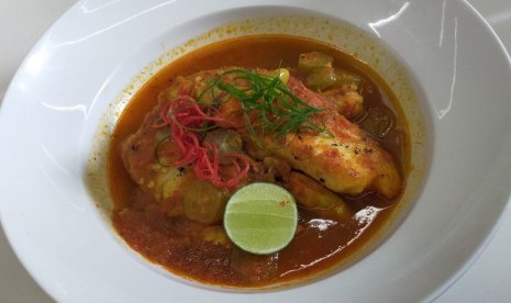 Ikan tilapia masak asam pedas.