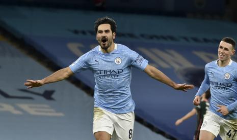 Ilkay Gundogan dari Manchester City saat merayakan gol.