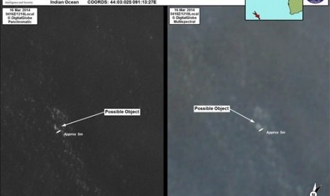 In this March 16, 2014 satellite imagery provided by Commonwealth of Australia - Department of Defence on Thursday, March 20, 2014, a floating object is seen at sea next to the descriptor which was added by the source. 