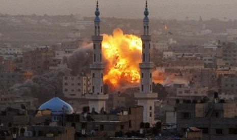 In this Nov. 17, 2012 file photo, smoke rises during an explosion from an Israeli strike in Gaza City.   