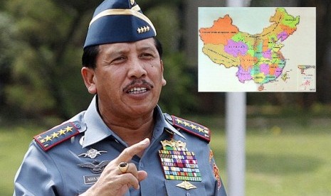 Indonesian Defense Forces (TNI) Commander Admiral Agus Suhartono and Map of China (insert)  