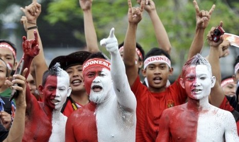 Indonesian supporters during a football match. (illustration)