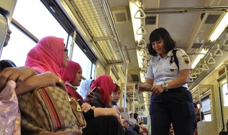 Inside the female commuter line on Monday.   