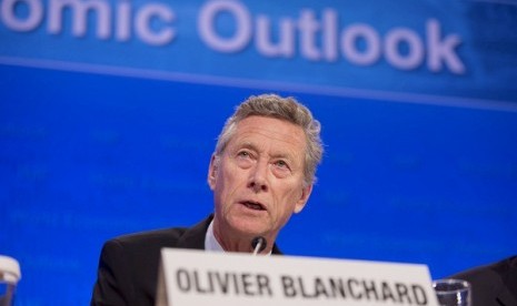 International Monetary Fund Economic Counsellor and Director of the Research Department, Olivier Blanchard answers a question during a joint press conference on the World Economic Outlook at the IMF Headquarters in Washington, April 16, 2013. 