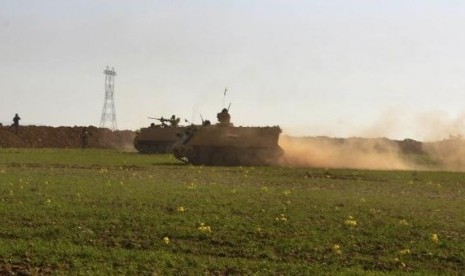 Iraqi soldiers take part in an intensive security deployment in Sulaiman Pek, 160 km (99 miles) north of Baghdad, February 21, 2014.