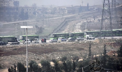 Iringan bus pengungsi di Aleppo