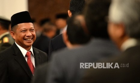 Irjen Pol Tito Karnavian menerima ucapan selamat dri rekan usai mengikuti pelantikan Kepala BNPT oleh Presiden Joko Widodo di Istana Negara, Jakarta, Rabu (16/3).