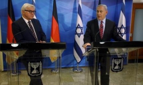 Israel's Prime Minister Benjamin Netanyahu (right) and Germany's Foreign Minister Frank-Walter Steinmeier deliver joint statements to the media before their meeting in Jerusalem November 16, 2014.