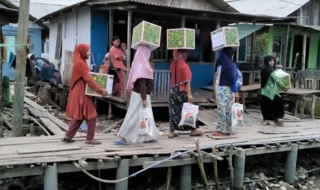 IZI salurkan Paket Ramadhan ke Kampung Nelayan, Sumatra Utara.