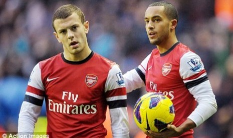 Jack Wilshere dan Theo Walcott.