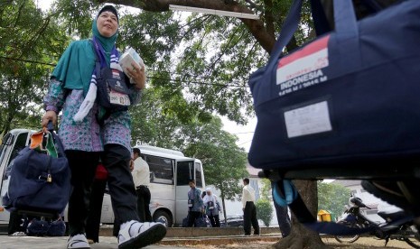 Jamaah Calon Haji (JCH) asal Sumsel tiba di Asrama Haji Palembang, Sumatera Selatan, Kamis (27/8).