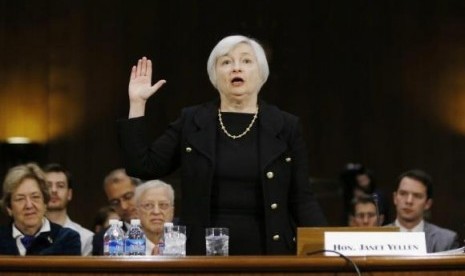 Janet Yellen, President Barack Obama's nominee to lead the U.S. Federal Reserve, is sworn in to testify at her US Senate Banking Committee confirmation hearing in Washington in this file photo taken November 14, 2013.