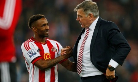 Jermain Defoe (kiri)