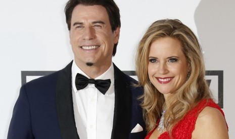 Pasangan selebritas John Travolta dan Kelly Preston. Pada Ahad, Travolta mengumumkan istrinya meninggal dunia setelah dua tahun berjuang melawan kanker payudara.