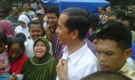 Jokowi dan warga pengungsi Kebon Baru, Tebet, Rabu (22/1)