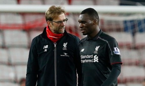 Juergen Klopp (kiri) bersama Christian Benteke