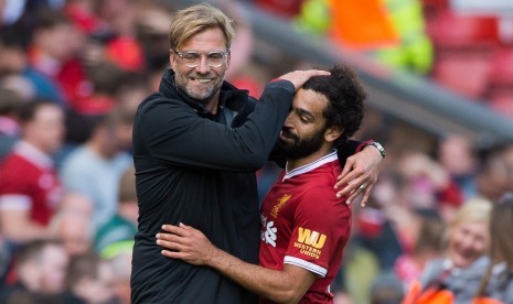 Pelatih Liverpool Juergen Klopp (kiri) dan Mohamed Salah.