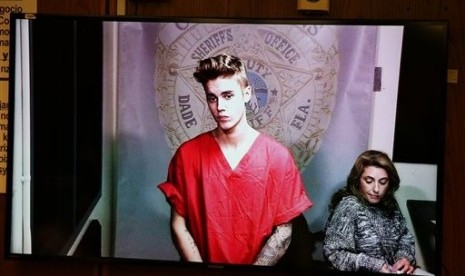 Justin Bieber appears in court via video feed, Thursday, Jan. 23, 2014, in Miami. 