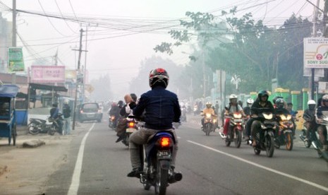 Kabut asap melanda Palembang