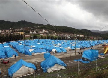 Kamp pengungsi Suriah di Yayladagi, Turki. Mereka meninggalkan negaranya karena tertindas oleh rezim otoriter Presiden Bashar Al-Assad.