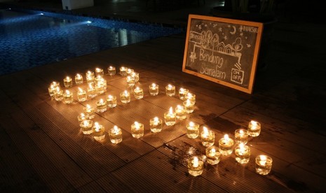 Kampanye Earth Hour di Nexa Hotel Bandung dengan beberapa komunitas