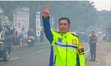 Kapolres Cilegon  AKBP Eko Tjahyo Utomo, saat mengatur lalu lintas arus balik mudik lebaran.  