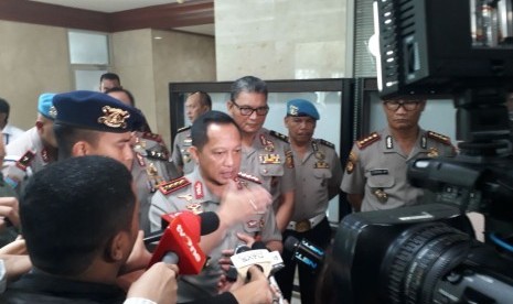 Kapolri Jenderal Tito Karnavian saat hadir dalam rapat kerja dengan Komisi III DPR di Kompleks Parlemen Senayan, Jakarta pada Rabu (14/3).