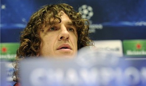 Kapten Barcelona, Carles Puyol, menggelar jumpa pers di Stadion San Siro, Milan, Selasa (19/2) jelang laga Liga Champions lawan AC Milan.