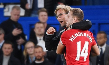 Kapten Liverpool, Jordan Henderson dan pelatih, Juergen Klopp.