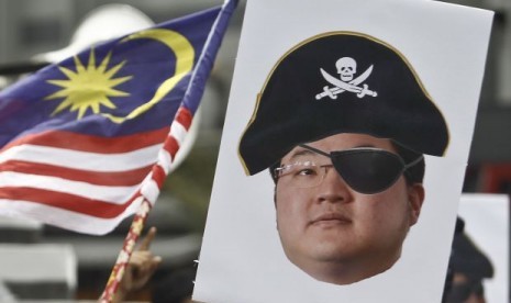 Karikatur pengusaha Jho Low yang menjadi buronan pemerintah Malaysia. Jho Low disebut menjadi salah satu aktor utama dalam skandal 1MDB