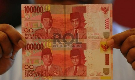 The new Indonesia's bank notes (above) and the old one (illustration)