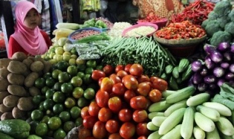 A shop sells vegetables at a traditional market. (illustration)