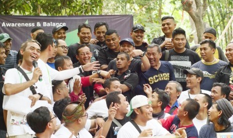 Kegiatan di Milad ke-11 komunitas motor scorpio, SC225 di Jakarta