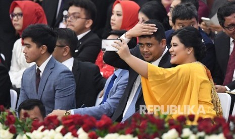 Keluaraga Presiden Joko Widodo mengikuti upacara pelantikan Presiden dan Wakil Presiden di Gedung Nusantara, kompleks Parlemen, Senayan, Jakarta, Ahad (20/10/2019).