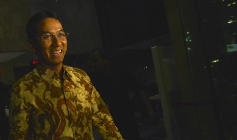 Kepala Badan Pengelola Keuangan dan Aset Daerah (BPKAD) DKI Jakarta Heru Budi Hartono keluar dari gedung KPK usai diperiksa KPK, di Jakarta, Kamis (14/6).