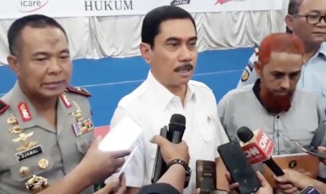 Kepala BNPT, Komjen Pol Suhardi Alius (Tengah) dan Umar Patek (Kanan)