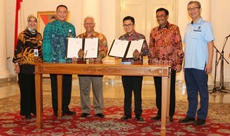 Kerja sama pembiayaan BNI Syariah dan Transjakarta.