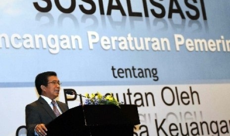 Ketua Dewan Komisioner Otoritas Jasa Keuangan Muliaman Hadad 