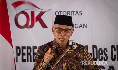 Ketua Dewan Komisioner Otoritas Jasa Keungan (OJK) Wimboh Santoso memberikan sambutan pada Peresmian Badan Usaha Milik Desa (BUMdes)