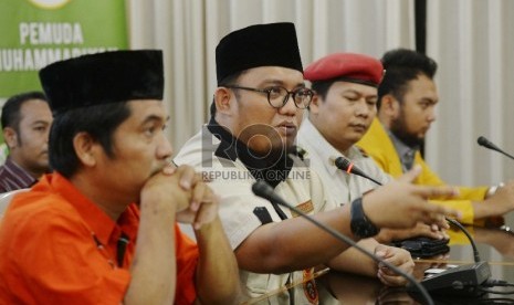 Ketua Ikatan Pemuda Muhammadiyah Dahnil Anzar Simanjuntak saat mmberikan keterangan pers di Gedung Pusat Muhammadiyah, Jakarta, Rabu (22/7).