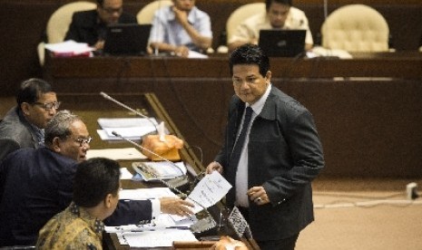 Ketua KPU Husni Kamil Manik di kompleks Parlemen Senayan, Jakarta, Senin (22/6).